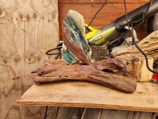 Row stone on wooden stand